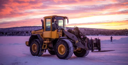 Tractor in sunset